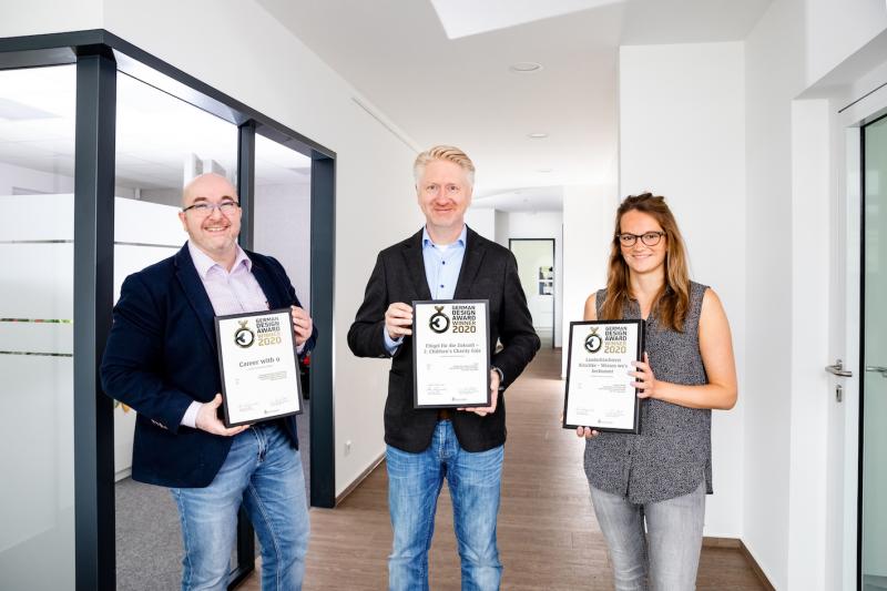 Die team4media-Geschäftsführer Axel Voss und Jörg Fiedler sowie Grafik-Designerin Franziska Prenzler