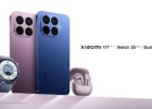 Xiaomi phones in purple and blue with a blue smartwatch and pink wireless earbuds on a white background.